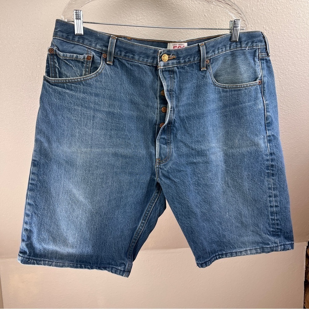 LEVI’S 501 Button Fly Cut-offs. Waist 21” • Rise 13-½” • Inseam 9-½”.100% Cotton